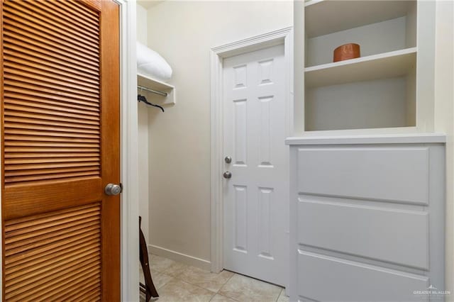 interior space with light tile patterned floors