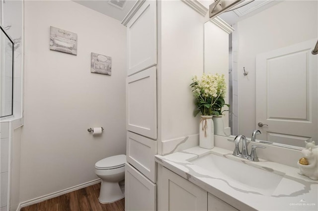 7809 N 27th St, Mcallen, TX 78504 - full bath with vanity, wood finished floors, and a shower