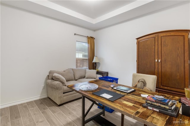 2104 Macquarie Dr, Edinburg, TX 78542 - office area with light wood-type flooring, baseboards, and a tray ceiling
