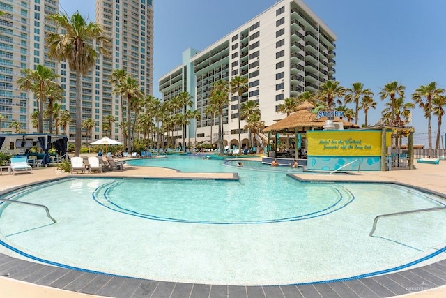 view of pool featuring a patio