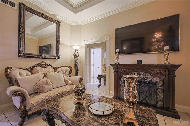 sitting room with light tile patterned floors, a fireplace, and crown molding