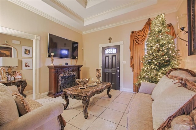 living room with light tile patterned floors, crown molding, and a tray ceiling