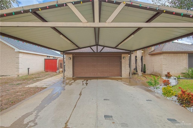 exterior space with a carport and a garage