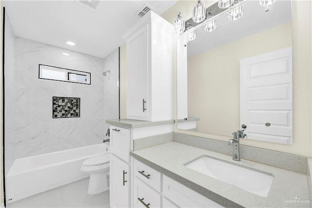 full bathroom with tile patterned flooring, vanity, toilet, and tiled shower / bath combo