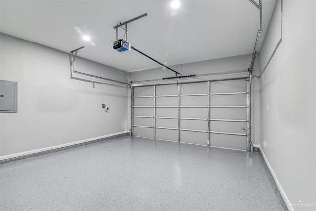 garage featuring electric panel and a garage door opener