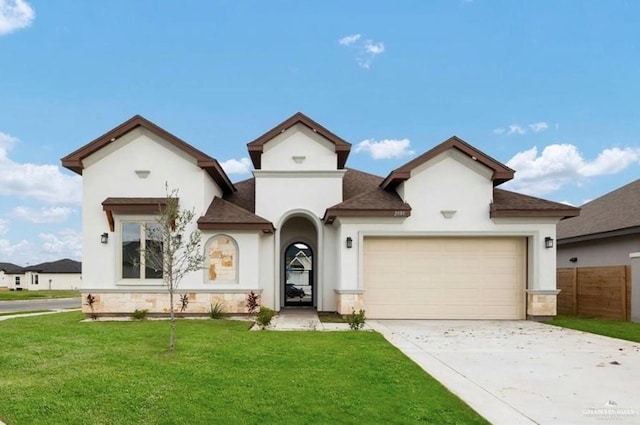 2080 Eagle Landing Dr, Edinburg, TX 78542 - view of front of home featuring stucco siding, a shingled roof, concrete driveway, and a garage