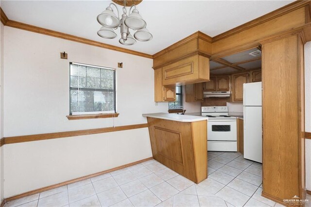 kitchen with kitchen peninsula, white appliances, pendant lighting, light tile patterned floors, and a chandelier