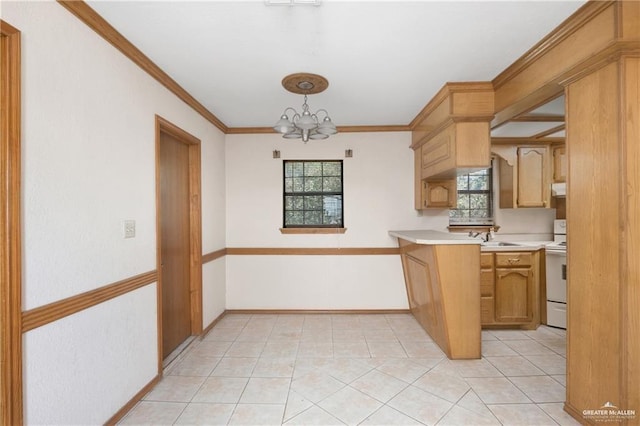 kitchen with ornamental molding, sink, pendant lighting, a chandelier, and white stove