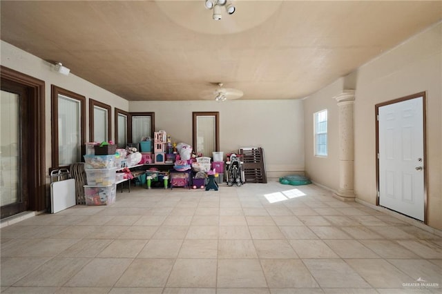view of patio / terrace featuring ceiling fan