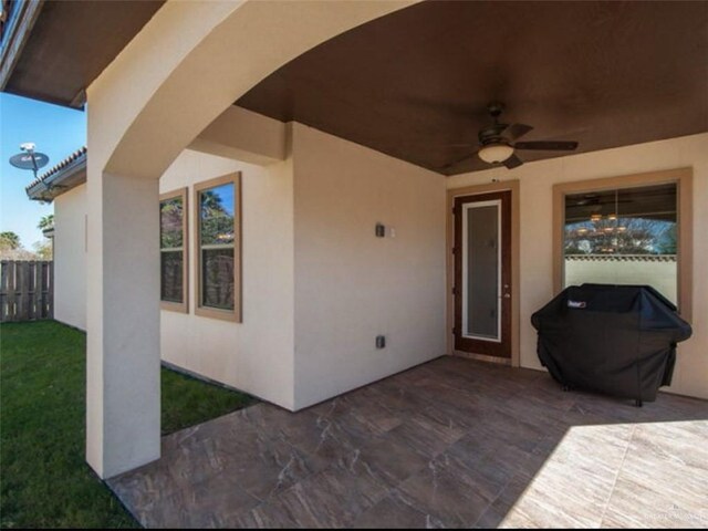 view of patio with ceiling fan