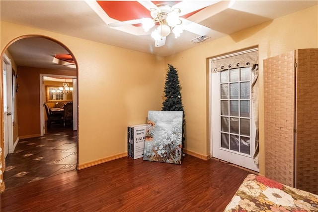 interior space featuring dark hardwood / wood-style flooring and ceiling fan