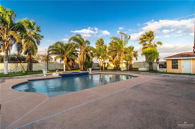 view of swimming pool featuring a patio