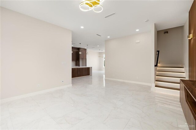 2705 E Solar Dr, Mission, TX 78501 - spare room featuring recessed lighting, stairway, visible vents, and marble finish floor