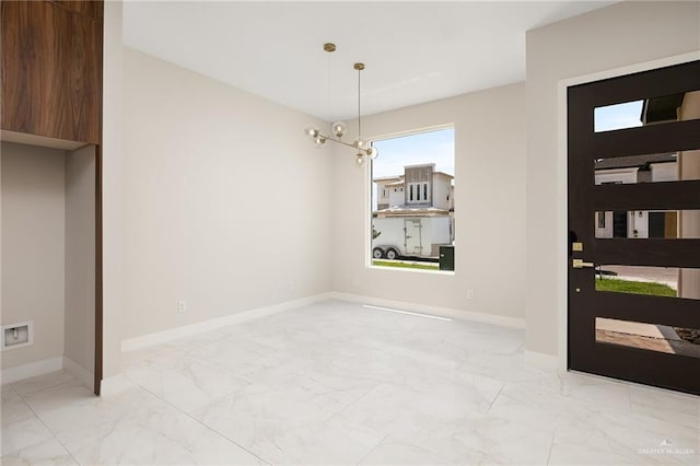interior space featuring baseboards and marble finish floor