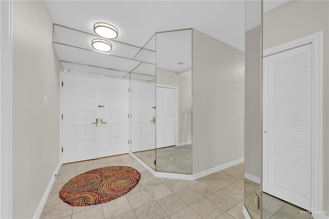 334 Padre Blvd Unit 801, South Padre Island, TX 78597 - entryway featuring baseboards and tile patterned floors