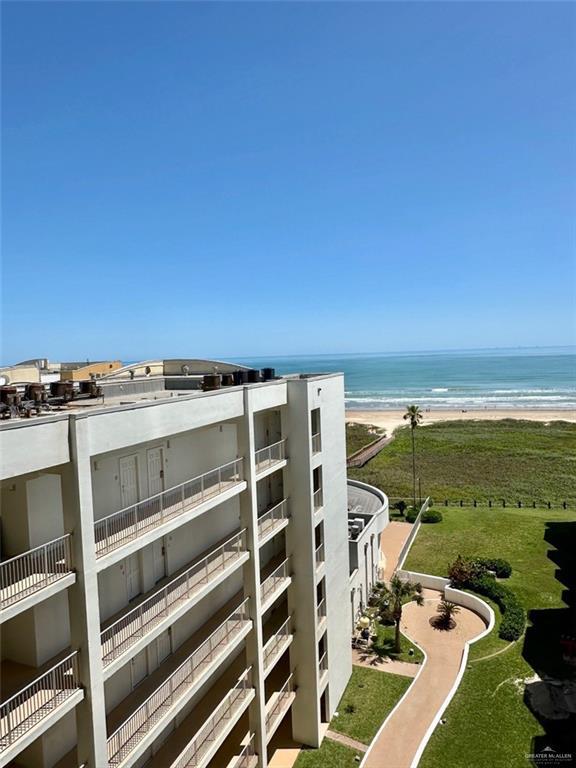 334 Padre Blvd Unit 801, South Padre Island, TX 78597 - view of building exterior with view of water and beach
