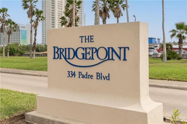 view of community sign