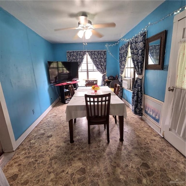 16073 S US Highway 281, San Benito, TX 78586 - dining area with stone finish floors and a ceiling fan