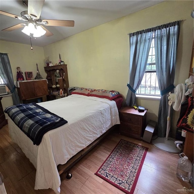 16073 S US Highway 281, San Benito, TX 78586 - bedroom featuring wood finished floors and ceiling fan