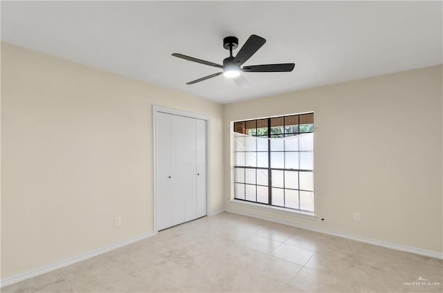 413 W Jonquil Ave, Mcallen, TX 78501 - unfurnished room with baseboards and a ceiling fan