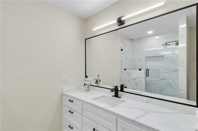 413 W Jonquil Ave, Mcallen, TX 78501 - bathroom featuring vanity and a marble finish shower