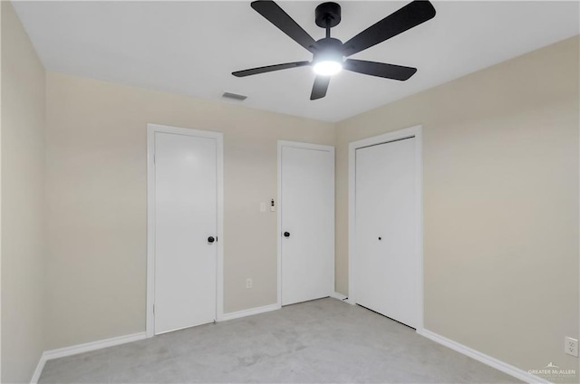 413 W Jonquil Ave, Mcallen, TX 78501 - unfurnished bedroom featuring baseboards, a ceiling fan, and light carpet