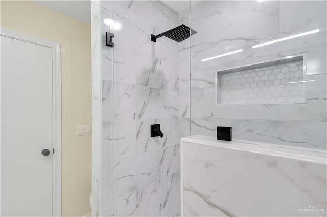 413 W Jonquil Ave, Mcallen, TX 78501 - bathroom with a marble finish shower