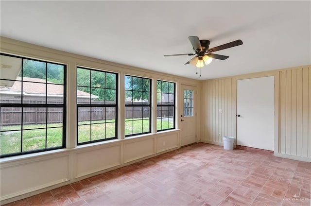 413 W Jonquil Ave, Mcallen, TX 78501 - empty room with a ceiling fan and brick patterned flooring