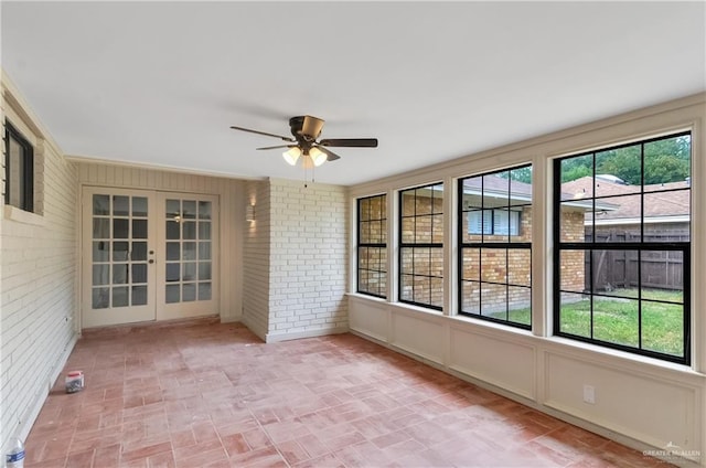 413 W Jonquil Ave, Mcallen, TX 78501 - unfurnished sunroom featuring french doors