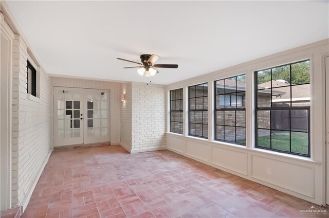 413 W Jonquil Ave, Mcallen, TX 78501 - unfurnished sunroom featuring french doors