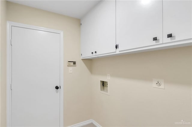 413 W Jonquil Ave, Mcallen, TX 78501 - laundry room with cabinet space, electric dryer hookup, hookup for a washing machine, and baseboards