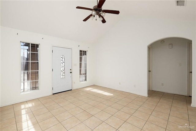 tiled foyer entrance with high vaulted ceiling and ceiling fan