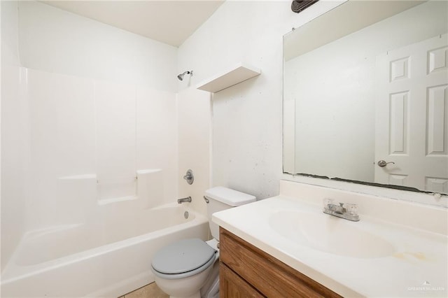 full bathroom featuring washtub / shower combination, vanity, and toilet