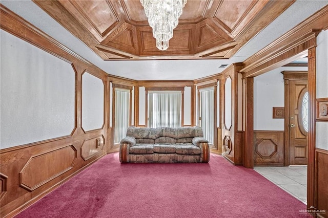 cinema room with light colored carpet, wooden ceiling, crown molding, and an inviting chandelier