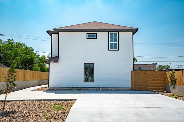 218 Kansas Ave, Weslaco, TX 78596 - rear view of house with a patio area and a fenced backyard
