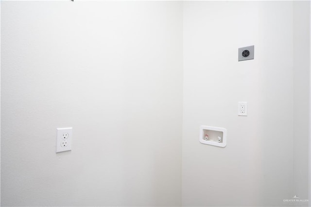 218 Kansas Ave, Weslaco, TX 78596 - clothes washing area featuring electric dryer hookup and washer hookup