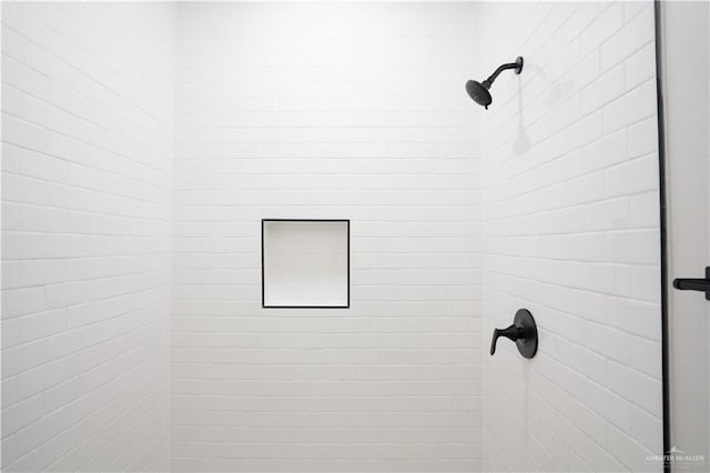 218 Kansas Ave, Weslaco, TX 78596 - bathroom featuring a tile shower