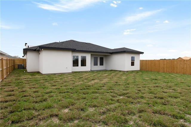 2023 Peace Dr, La Feria, TX 78559 - back of house with stucco siding