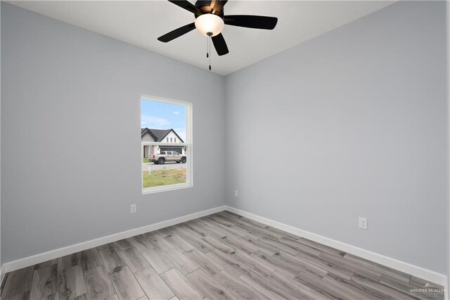 2023 Peace Dr, La Feria, TX 78559 - spare room featuring light wood-style floors, baseboards, and ceiling fan