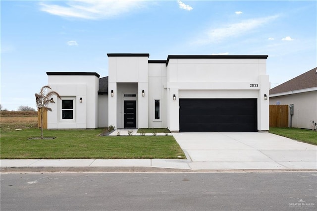 2023 Peace Dr, La Feria, TX 78559 - contemporary home featuring driveway and stucco siding