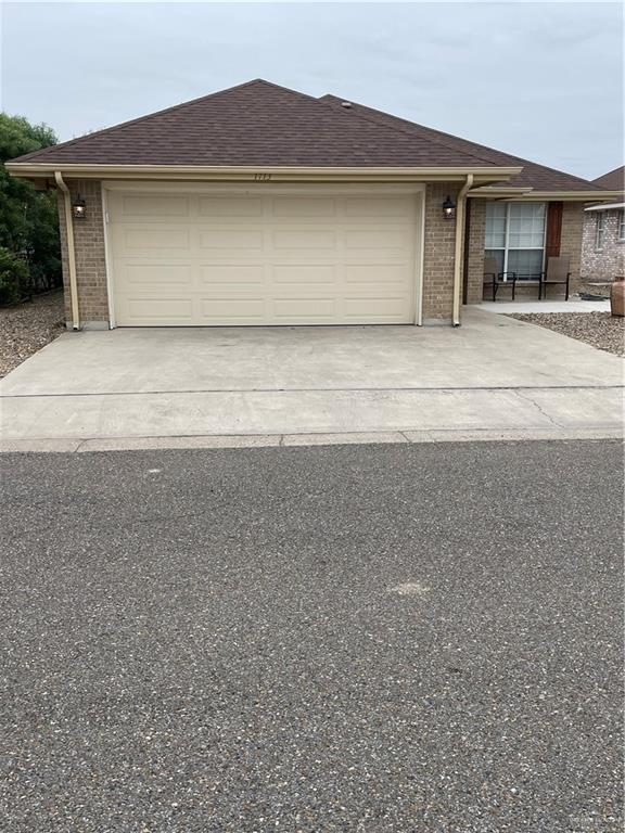 1713 Sun St, Mission, TX 78572 - ranch-style house featuring a garage
