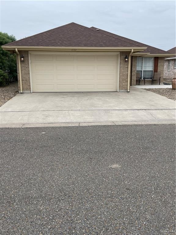 ranch-style house featuring a garage