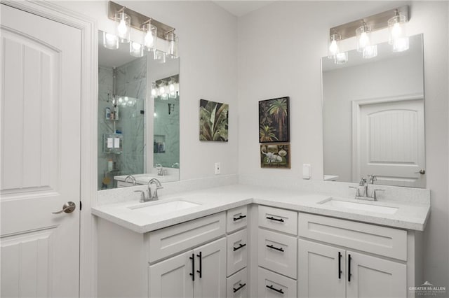 bathroom with an enclosed shower and vanity