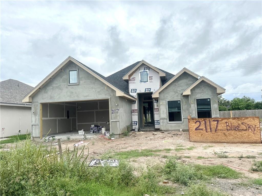 2117 Blue Sky Dr, Weslaco, TX 78599 - view of front of house featuring stucco siding