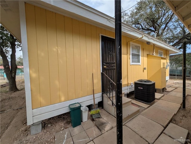 property entrance featuring cooling unit