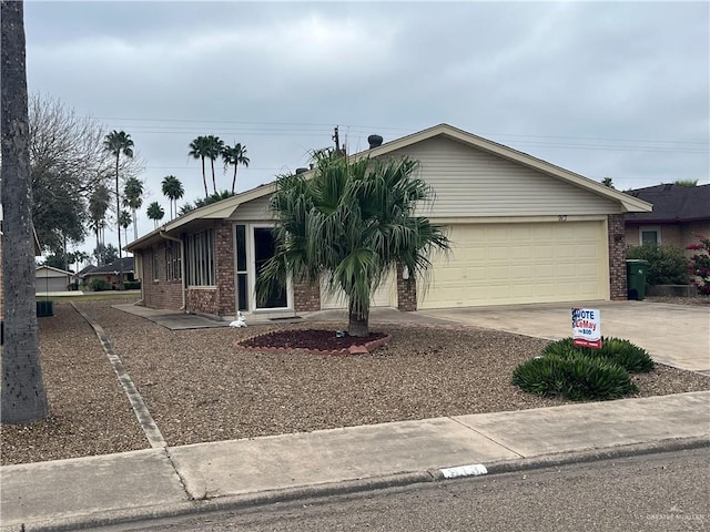 single story home with a garage