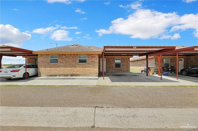 single story home with brick siding