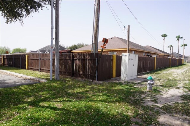 view of yard featuring fence