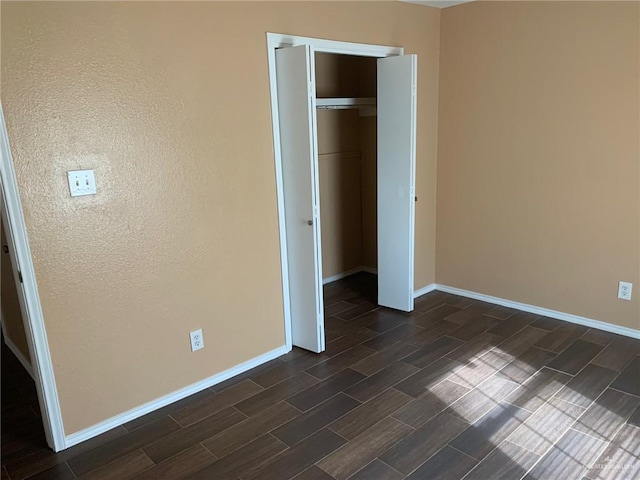 unfurnished bedroom featuring a closet