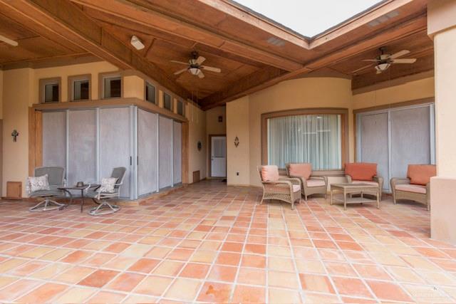 view of patio with ceiling fan and an outdoor hangout area